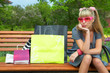 shopping blond woman in pink glass