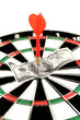 One-hundred dollar bill on a dartboard