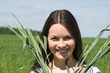The girl in field with ears in hands The girl in field with ears in hands