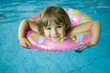 Little girl with inner tube