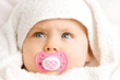Baby girl with dummy