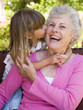 Photos : Grandmother getting a kiss from granddaughter