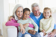 Grandparents posing with grandchildren