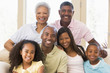Extended family sitting on sofa