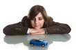 young woman dreaming with new car