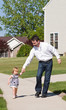 Father Walking With His Little Girl