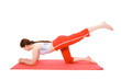 Young woman performing fitness exercises on the ground. Young woman performing fitness exercises on the ground.