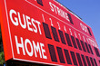 Photo: Red Baseball Scoreboard. Cropped. Low View/Angle. Red Baseball Scoreboard. Cropped. Low View/Angle.