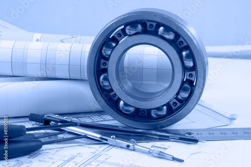Business accessories on a background of diagrams.