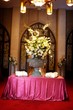 Table setup with flowers and wedding programs