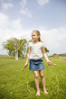 little girl playing with skipping rope