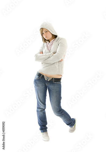 Photo: The young hip-hop girl isolated on a white The young hip-hop girl isolated on a white