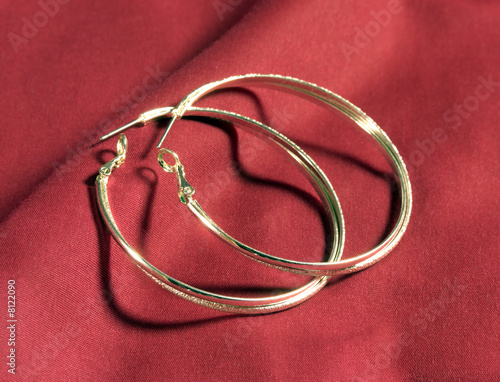 Photo: Silver Earings on Red Blanket Silver Earings on Red Blanket