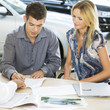 A young couple buying a new car