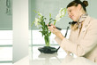 A receptionist talking on the telephone