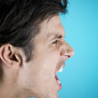 A young man shouting