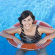 A young woman in a swimming pool