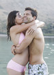 A couple embracing on holiday
