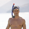 A man snorkeling in the sea