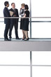 Group of business colleagues in modern office building