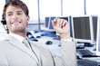 Businessman in a call centre or trading floor