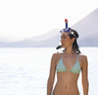 A woman snorkeling in the sea