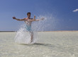 A man splashing in the sea