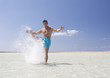 A man splashing in the sea