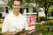 Estate agent outside property for sale