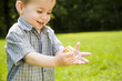 Baby Boy Playing Outdoors