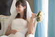 A bride sitting on a chair