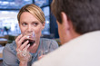 Couple drinking wine in restaurant, close-up