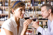 Woman and man drinking wine