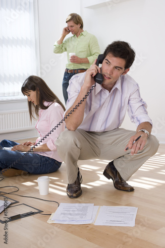 Photo: Businessman on telephone Businessman on telephone