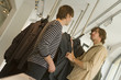 Men looking at clothes at a boutique.