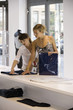 Women looking at clothes in a boutique.