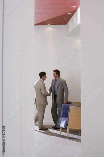 Photo: Businessman shaking hands with colleague Businessman shaking hands with colleague