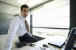 Businessman posing in office