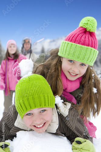 Photo: Family playing in snow Family playing in snow