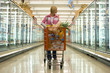 Woman grocery shopping in frozen foods section