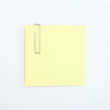Sticky note and paperclip