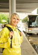 Beautiful young woman waiting for the bus