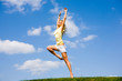 Happy young woman is dancing in a field Happy young woman is dancing in a field