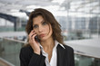 A businesswoman talking on her mobile phone.