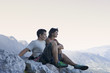 Two climbers resting at the top