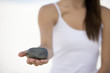 A woman holding a stone A woman holding a stone