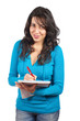 Young student woman writing