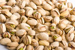 Pile of pistachio nuts close up