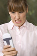 Woman angry at the phone