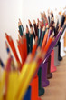 Photo: Row of multi-coloured colouring pencils in pots, close-up (still life, differential focus) Row of multi-coloured colouring pencils in pots, close-up (still life, differential focus)